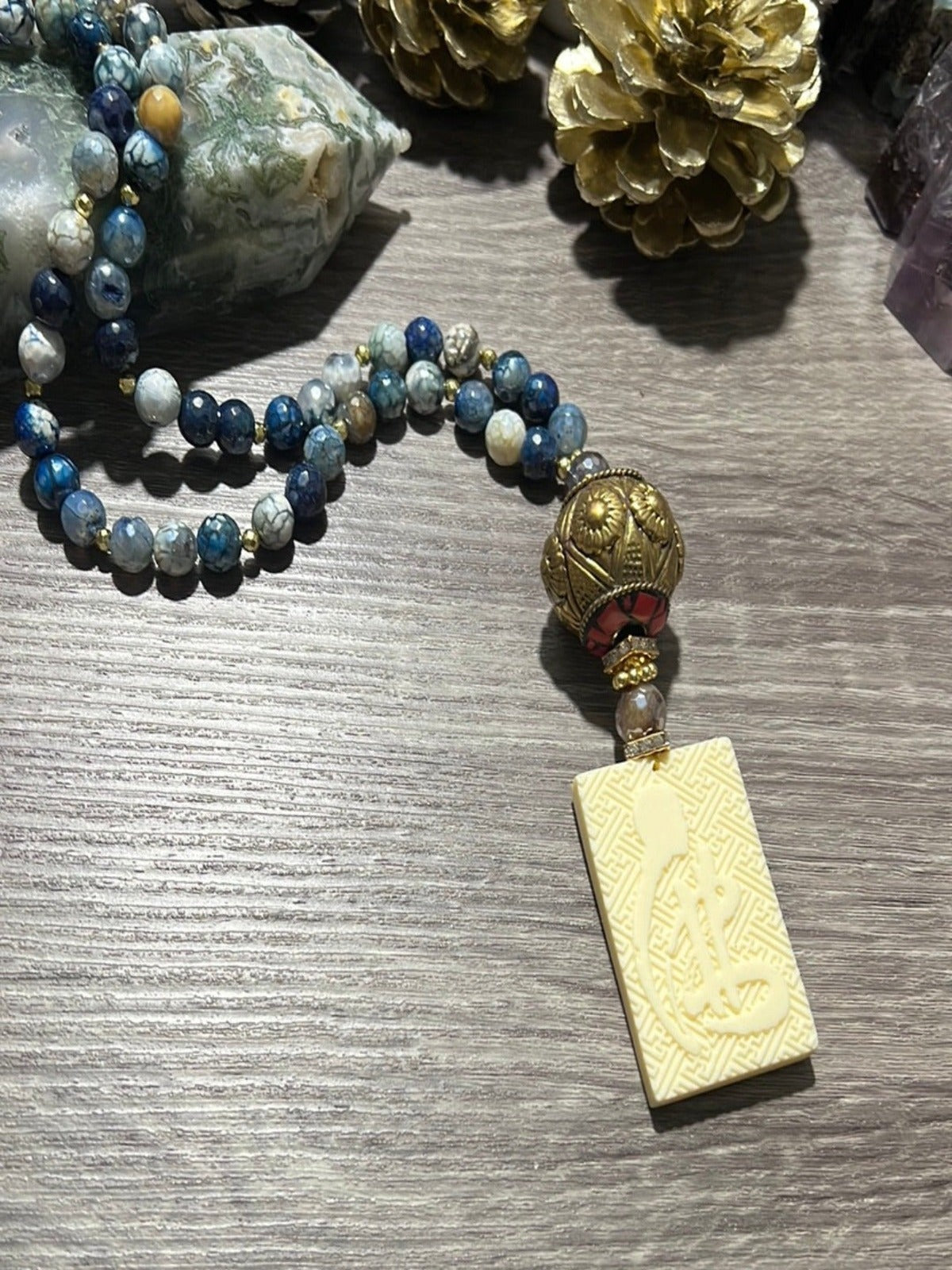 BUDHA FACE NECKLACE